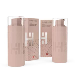 Crema de día ARIZE de HANZZ+HEIDII para piel normal a seca, envase blanco y dorado con efecto activador.